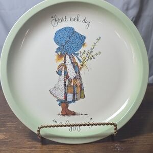 Ceramic Holly Hobbie Plate with Blue and Green Design And Girl Holding Flowers.